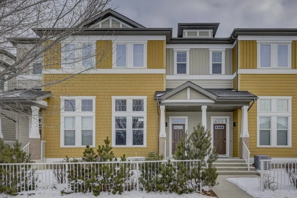 Out of town investors: Calgary skyline and Rocky Mountains