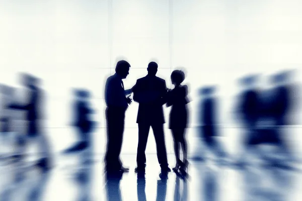 Pursuit Realty Group team silhouettes in a bright office